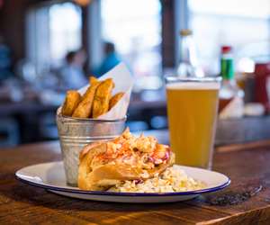 lobster roll with a pint of beer