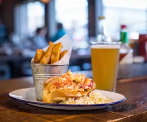 lobster roll with a pint of beer